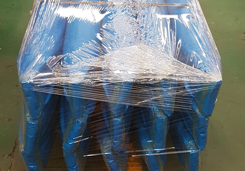 Feixe pintado e embalado para transporte